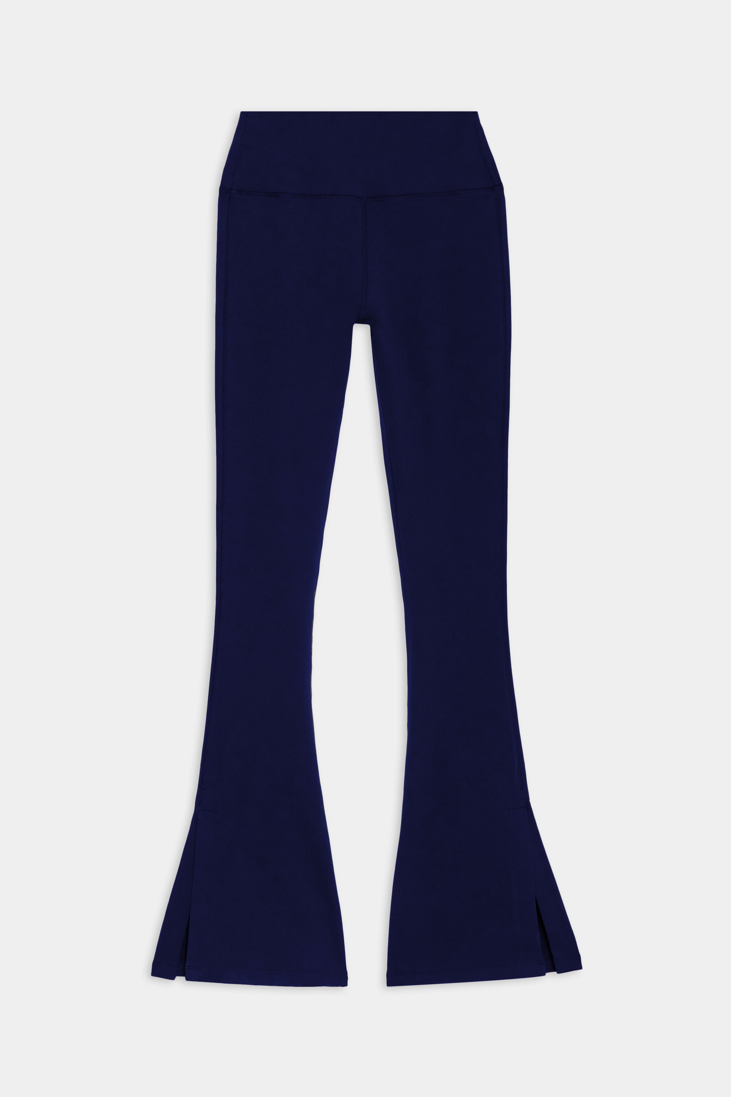 A pair of SPLITS59 Raquel High Waist Flare w/ Split Hem - Indigo bell bottoms.