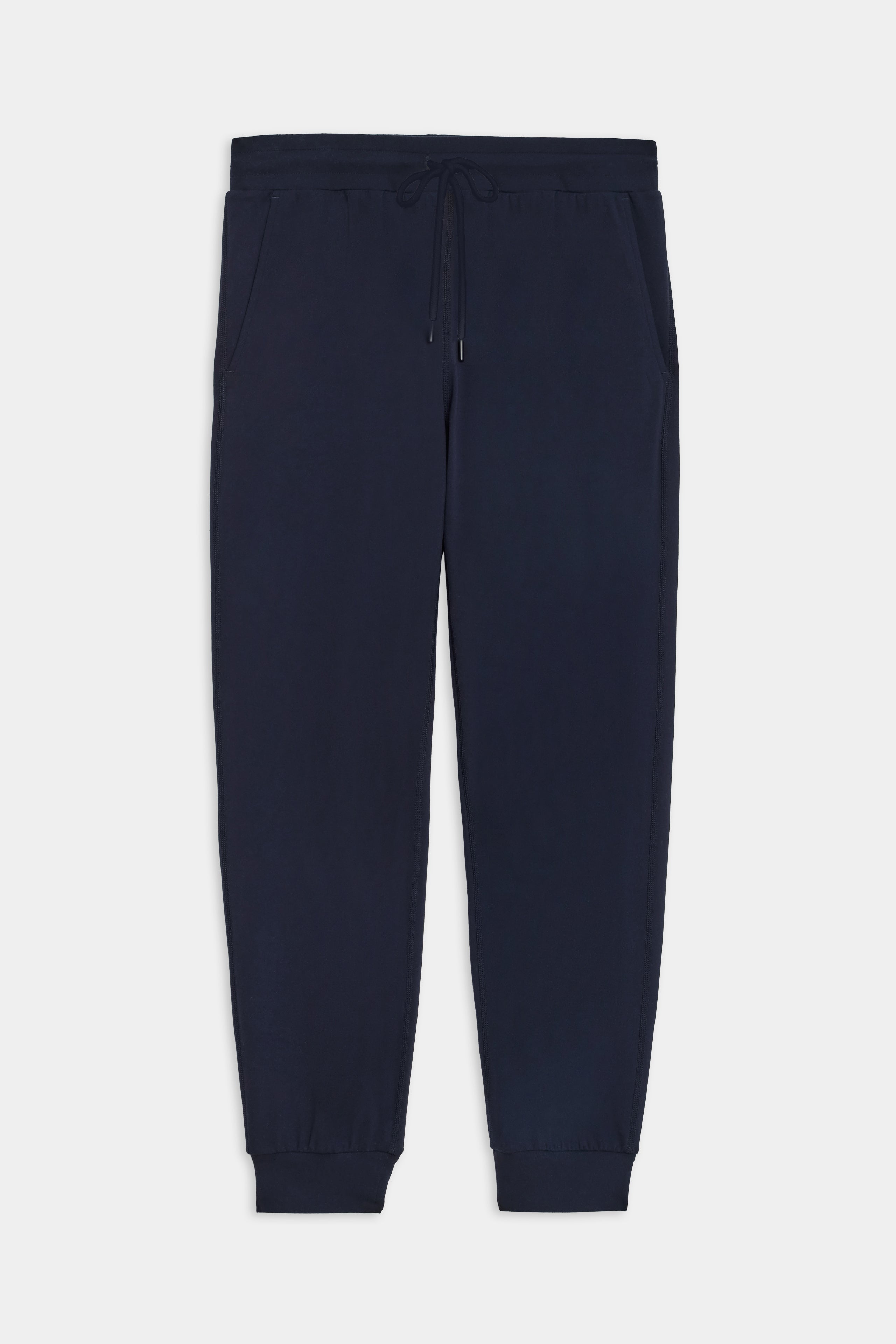 Flat view of dark blue sweatpants with black tie around waistband 