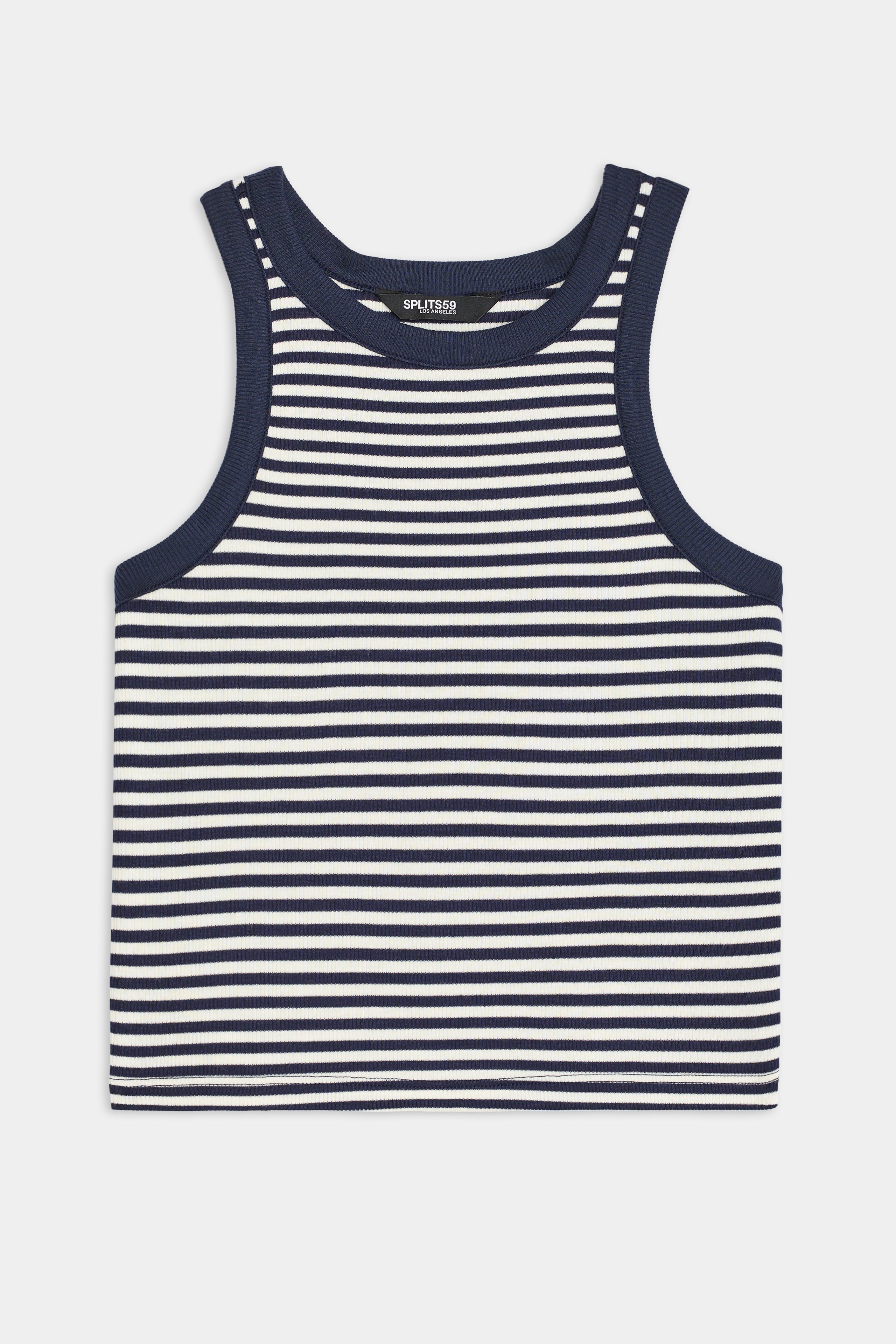 The Kiki Rib Crop Tank by SPLITS59 is a sleeveless cropped tank in white and indigo stripes, crafted from soft baby rib fabric. MADE IN LOS ANGELES.