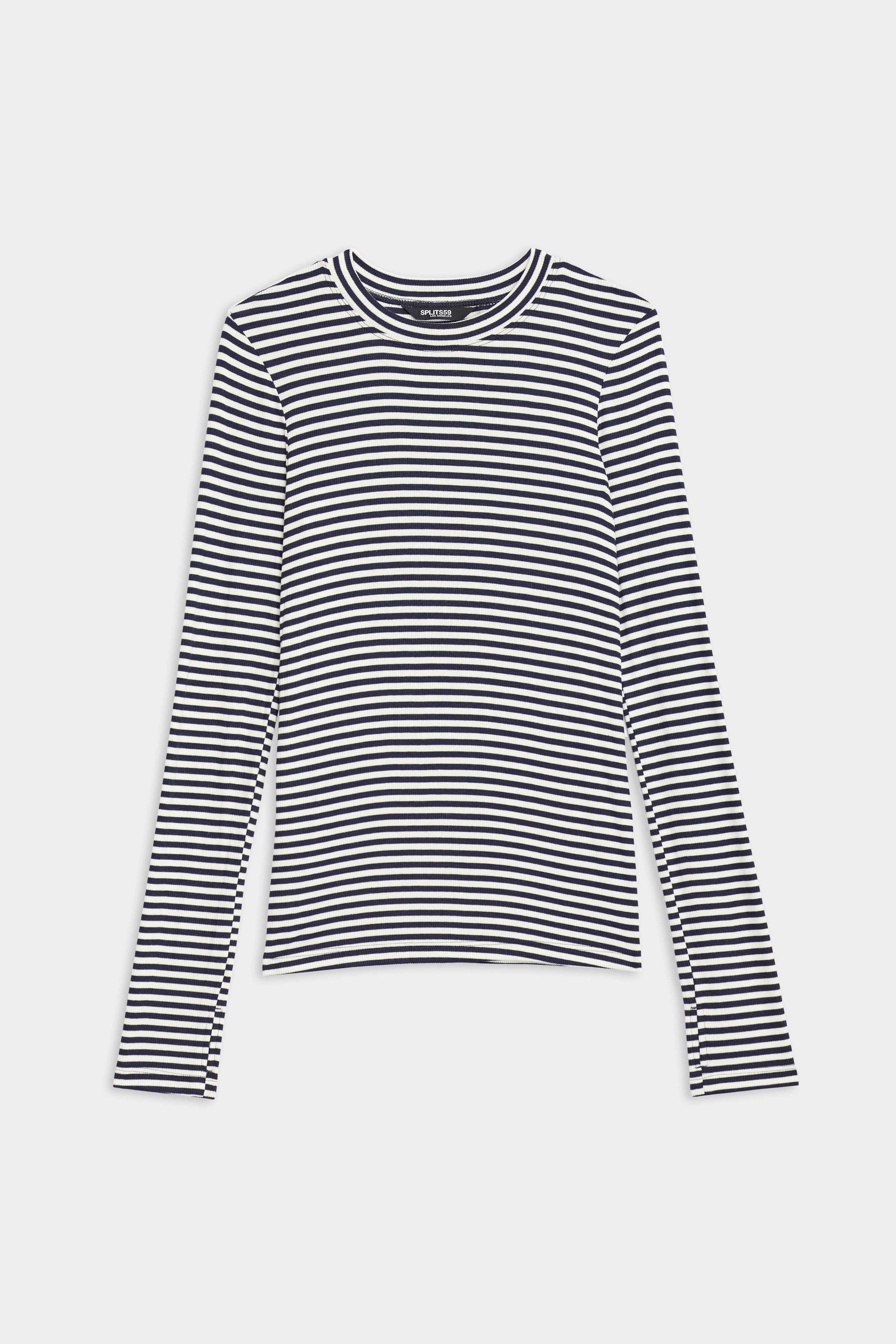 The Louise Rib Long Sleeve by SPLITS59, featuring white and indigo stripes, is showcased on a plain white background. Made in Los Angeles, this shirt combines super soft fabric with long sleeves for ultimate comfort.