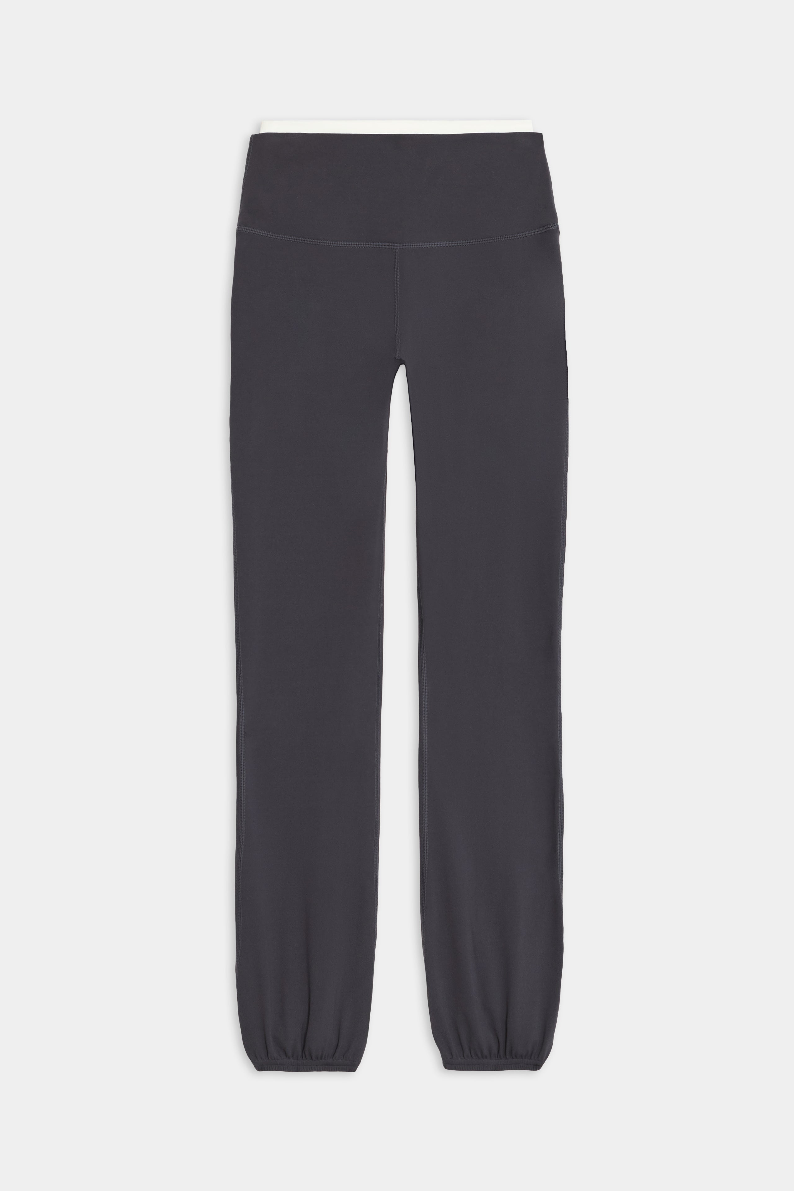 The Icon Dual High Waist Airweight Legging by SPLITS59, in dark gray, features an elastic waistband and cuffs, laid flat against a white background.