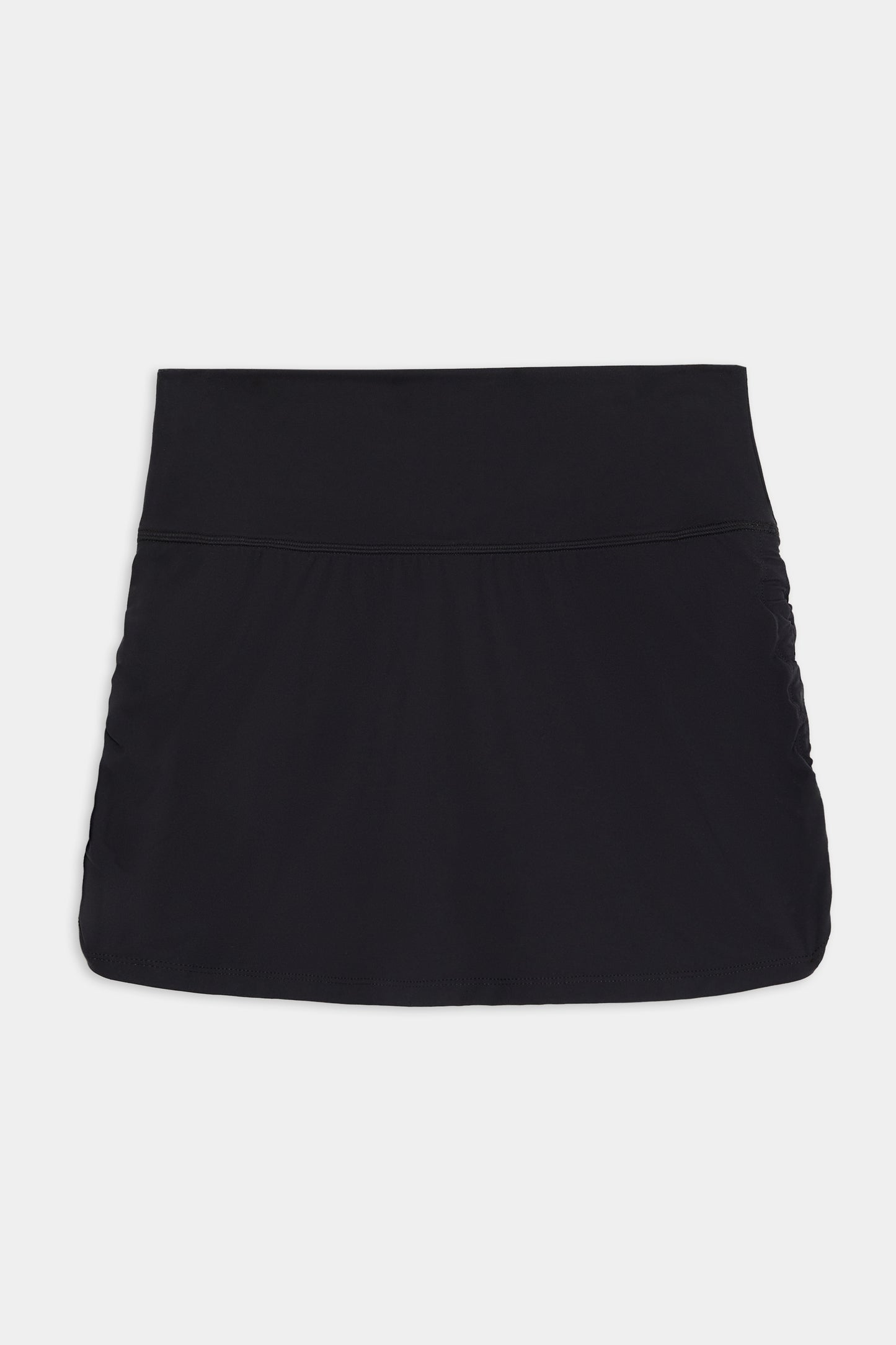 The Sally Rigor Skort - Black by SPLITS59, features a wide waistband and high-performance fabric, displayed against a plain white background.