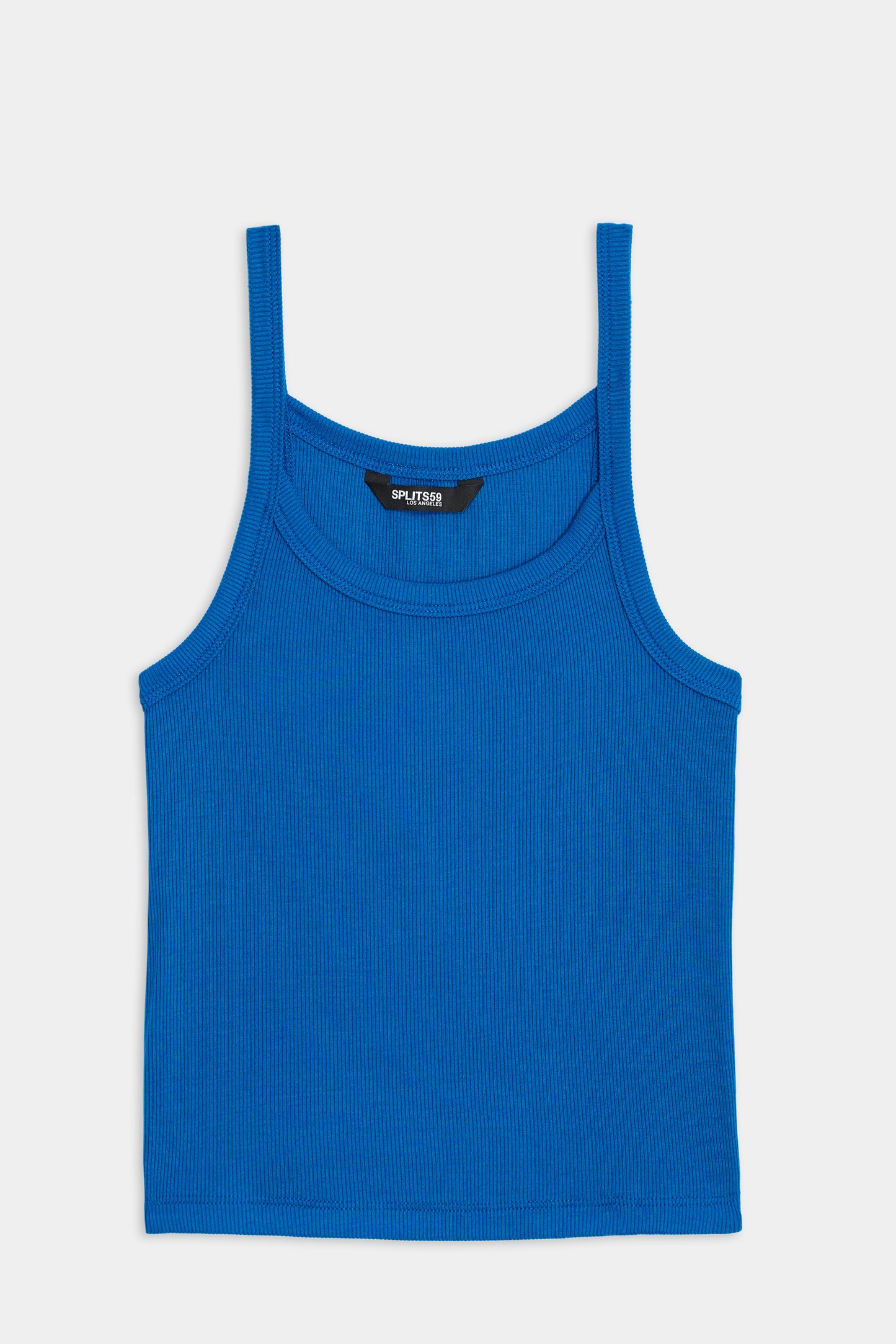 The Charlie Rib Tank by SPLITS59 features thin shoulder straps and a round neckline in blue, showcased on a plain white background.