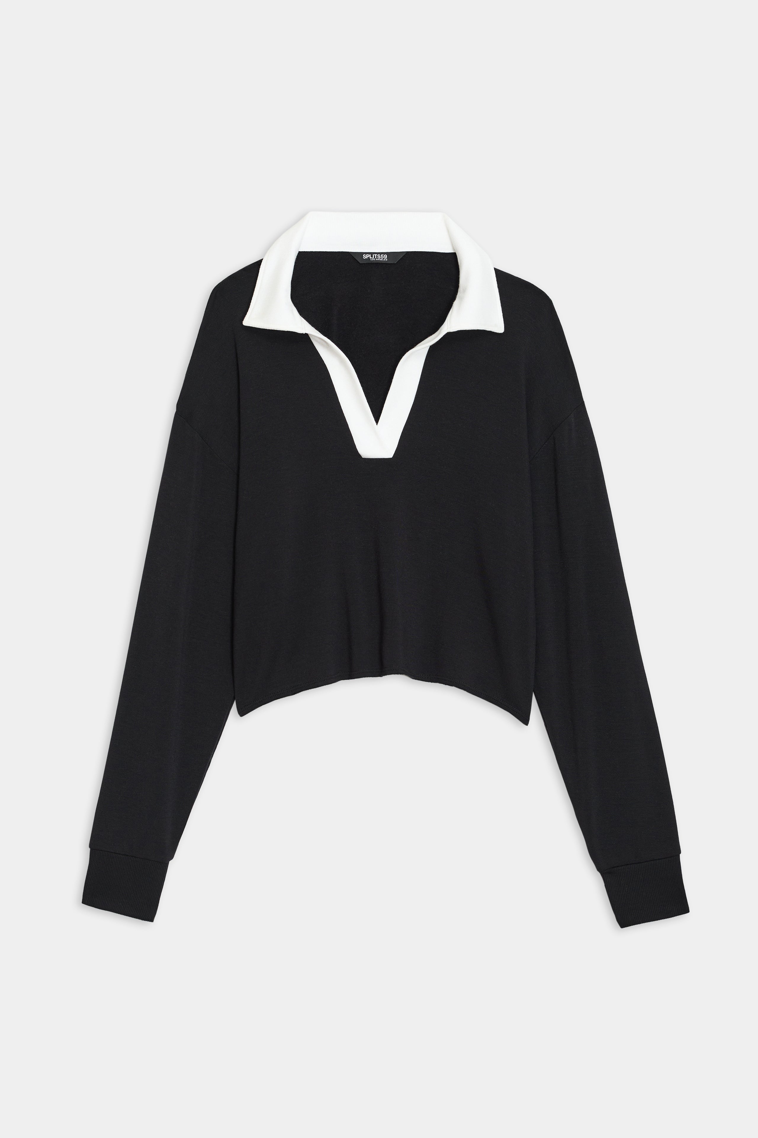 The Joan Fleece Polo Sweatshirt by SPLITS59 is a long-sleeve, black collared sweater with a white V-neck reminiscent of a classic rugby polo.